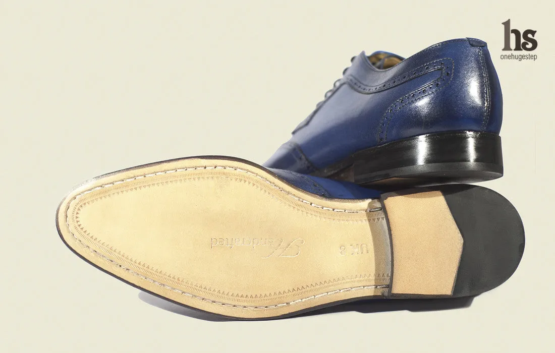 Wingtoe Derby Brogue with decoration punches on quarters